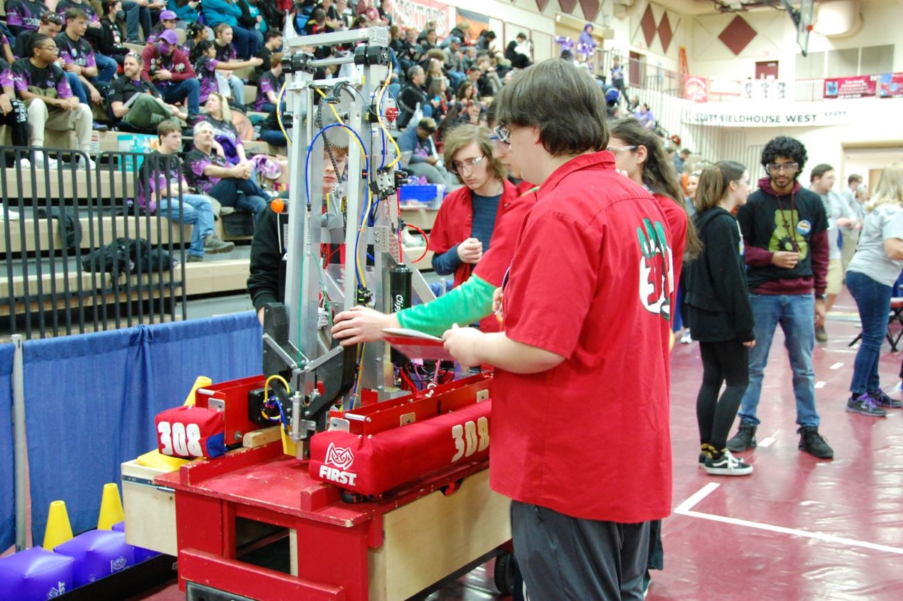 2023 FRC robot being pushed by cart.