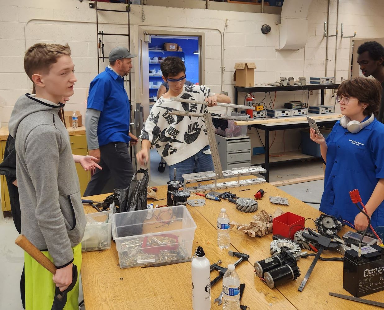 Students doing something in the workshop.